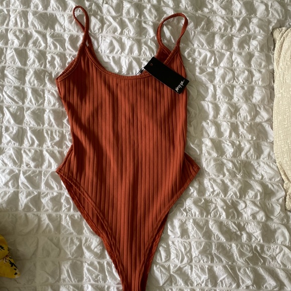 Nasty Gal Tops - Robbed Body Suit NWT